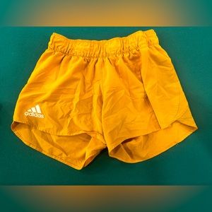 Yellow adidas shorts